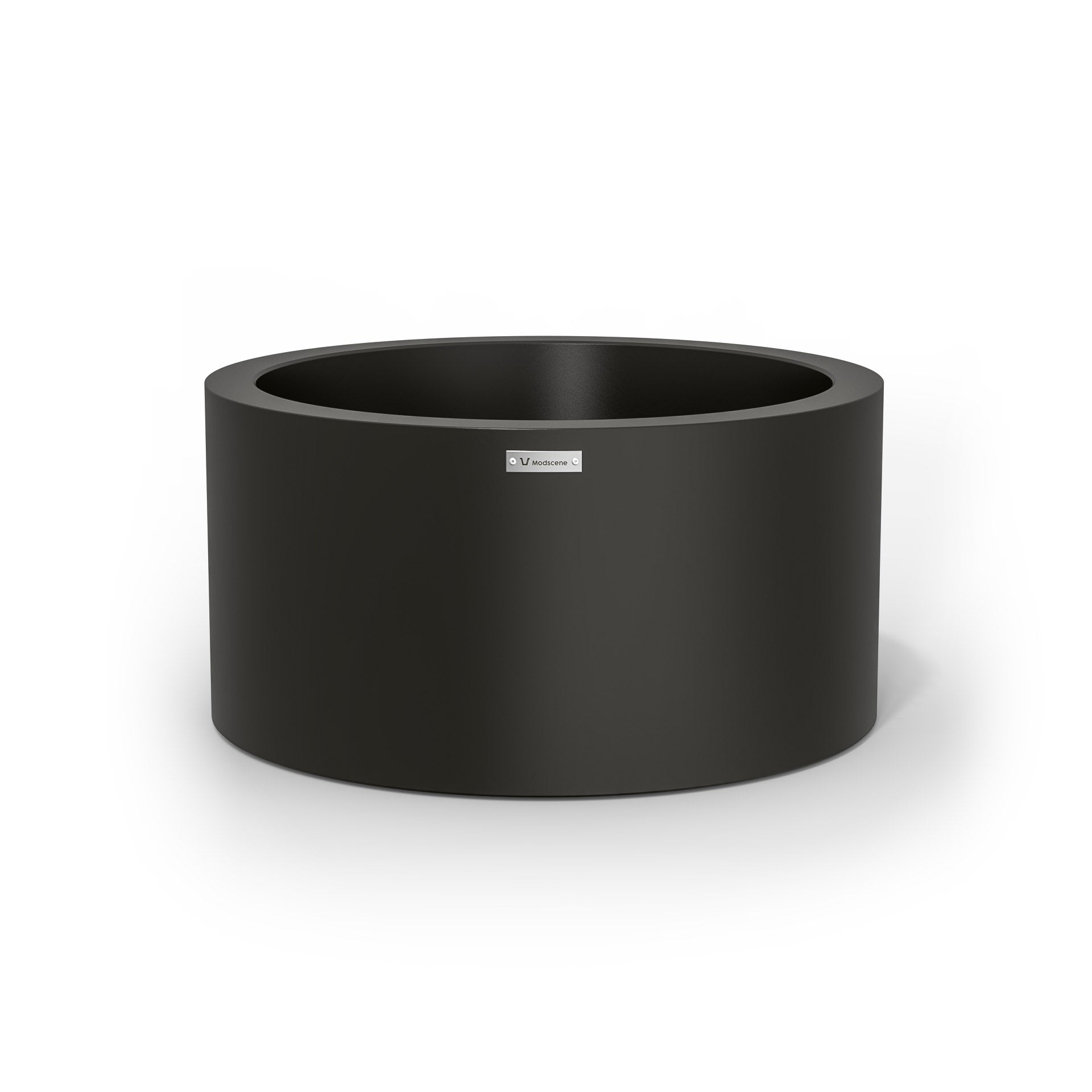 A black cylinder pot planter made by Modscene. Australian planters.