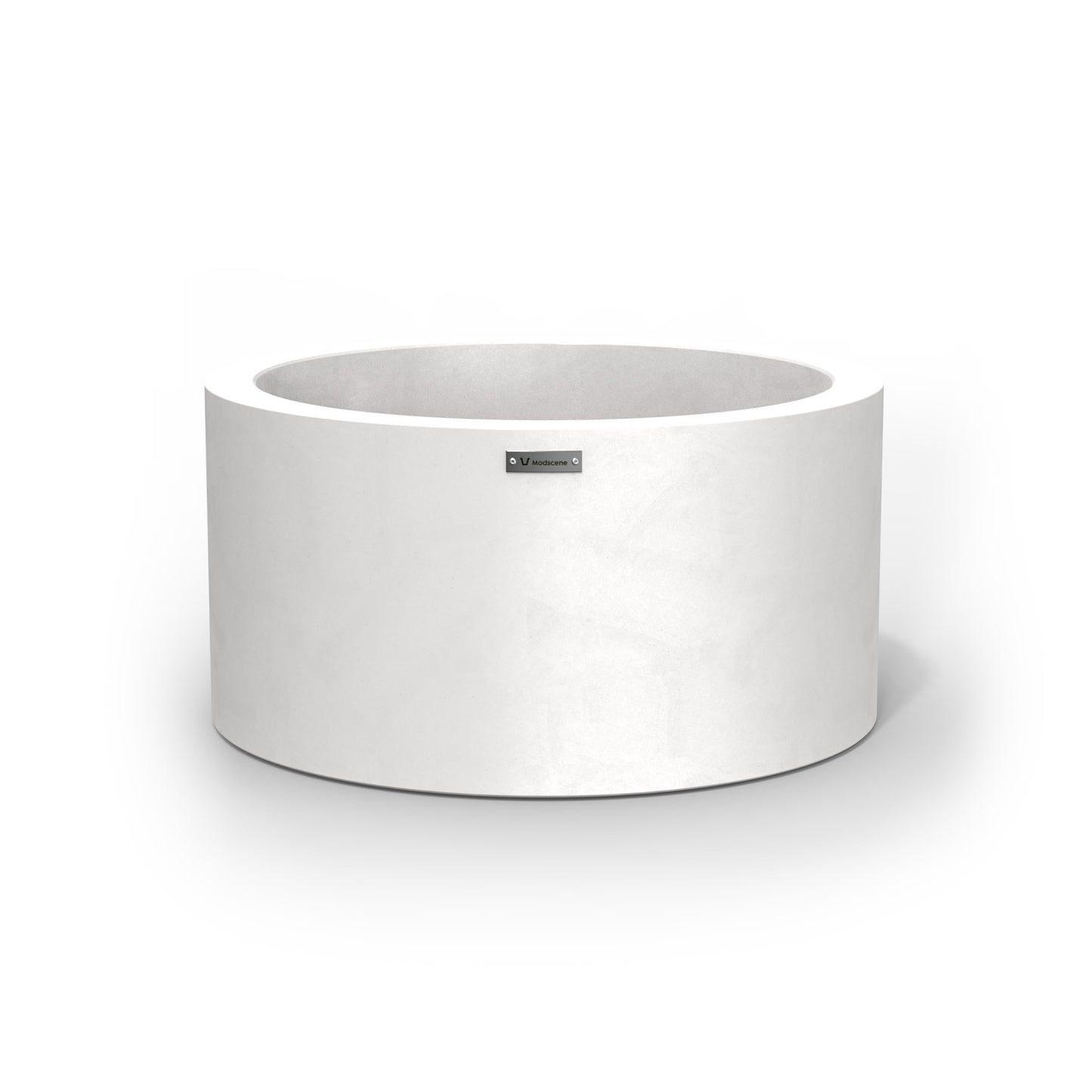 A matte white cylinder pot planter made by Modscene.