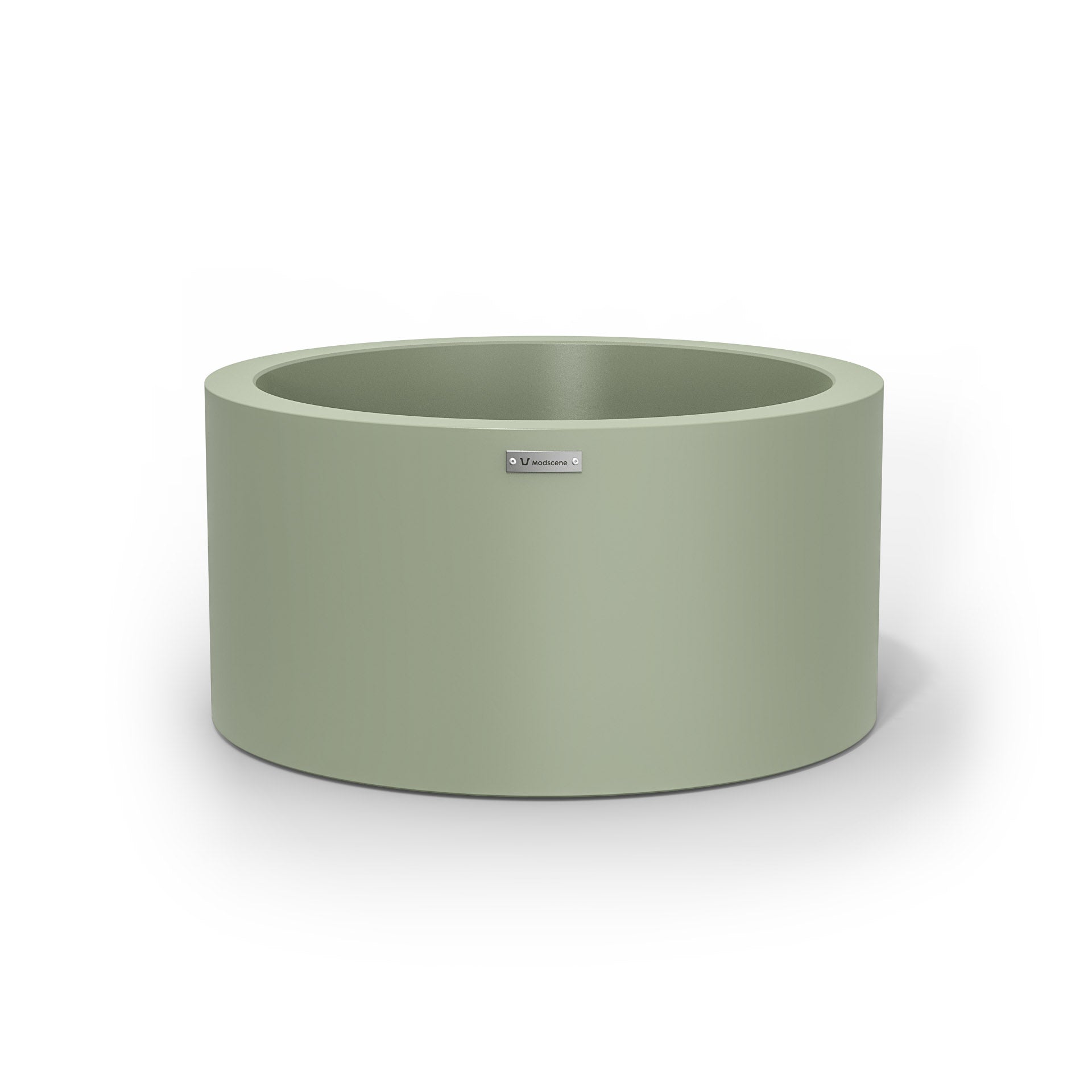 A pastel green cylinder pot planter made by Modscene. Australian planters.