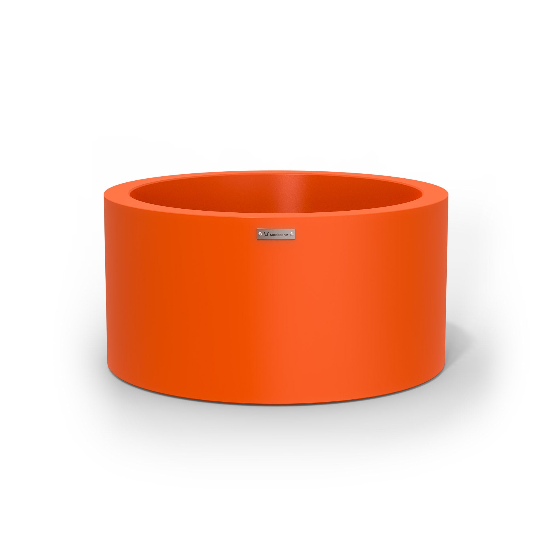 A medium sized orange planter pot made by Modscene.