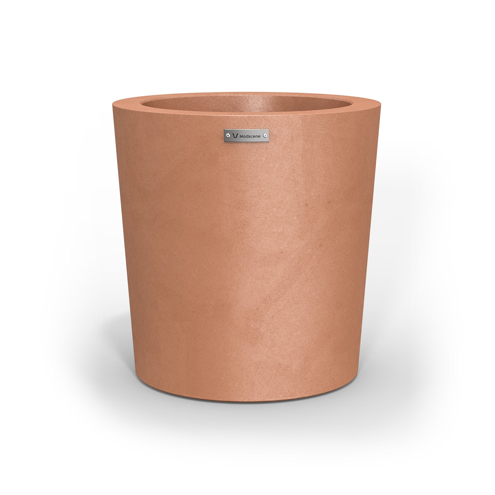 A modern designer planter pot in a rustic terracotta colour.