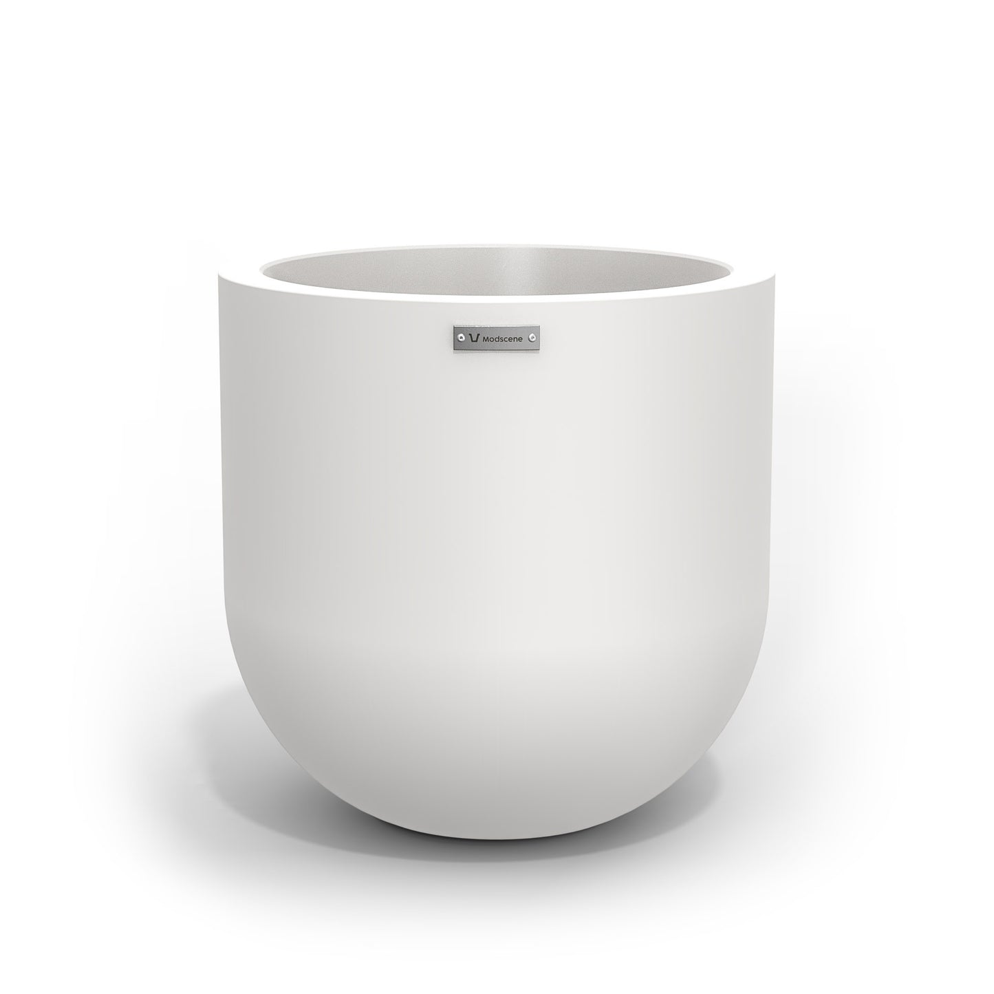 A medium sized white planter pot made by Modscene.