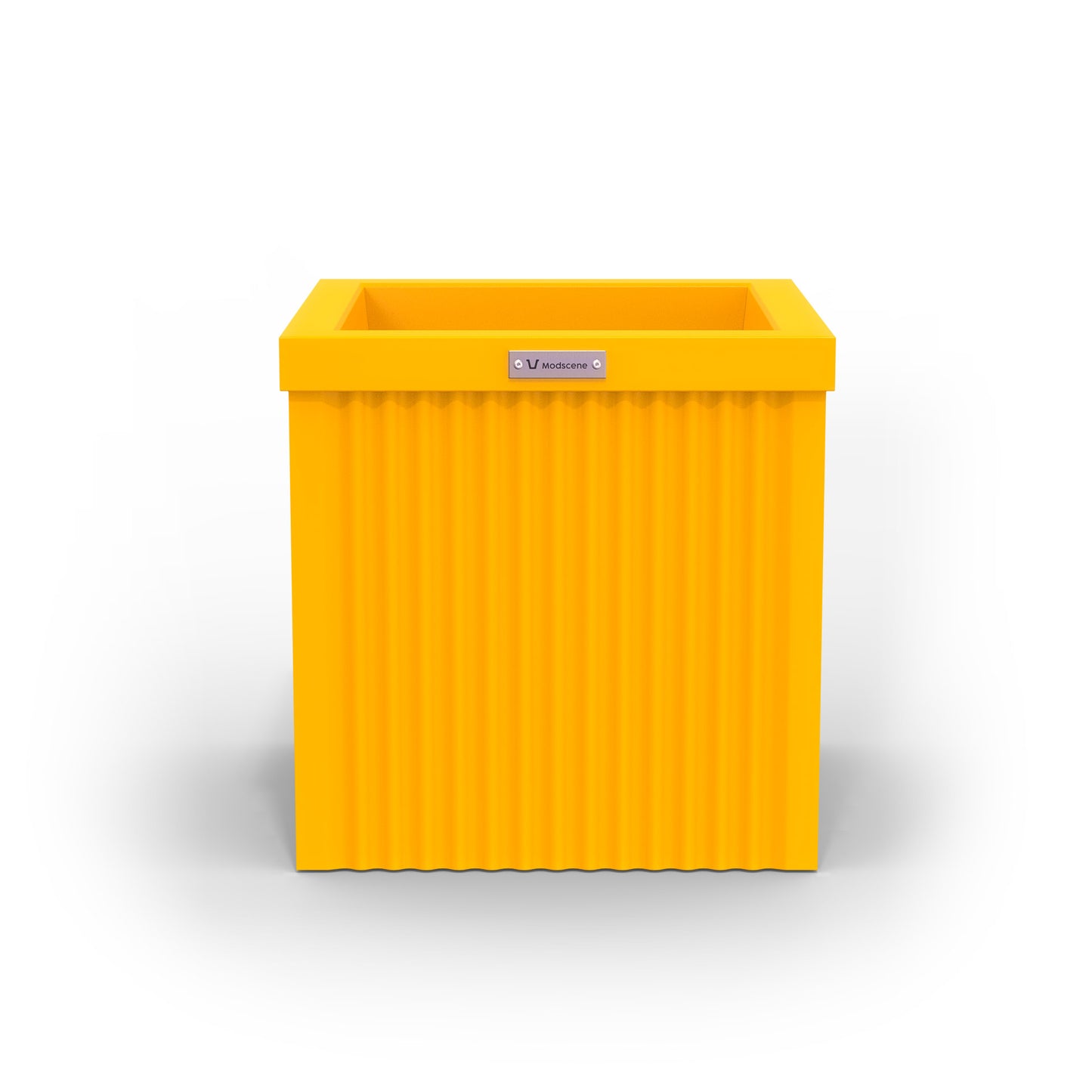 A yellow cube shaped planter pot made by Modscene.