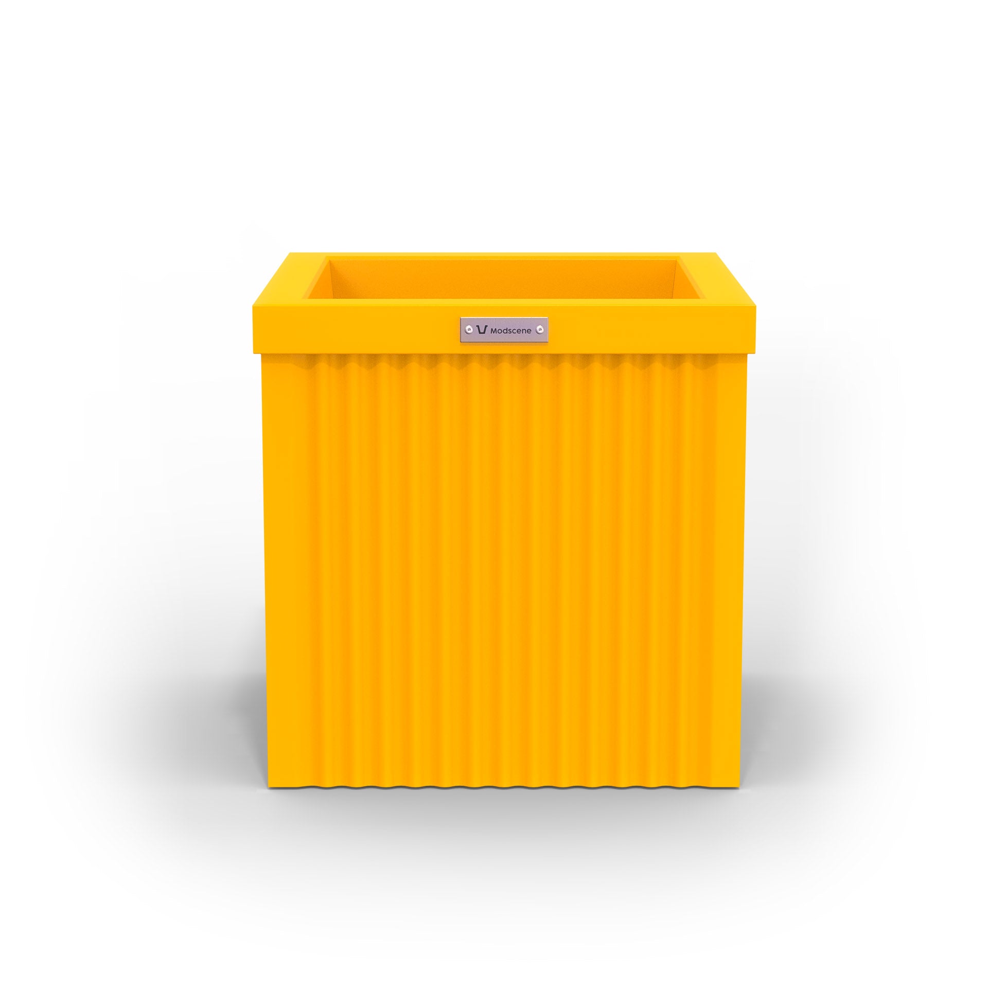 A yellow cube shaped planter pot made by Modscene.