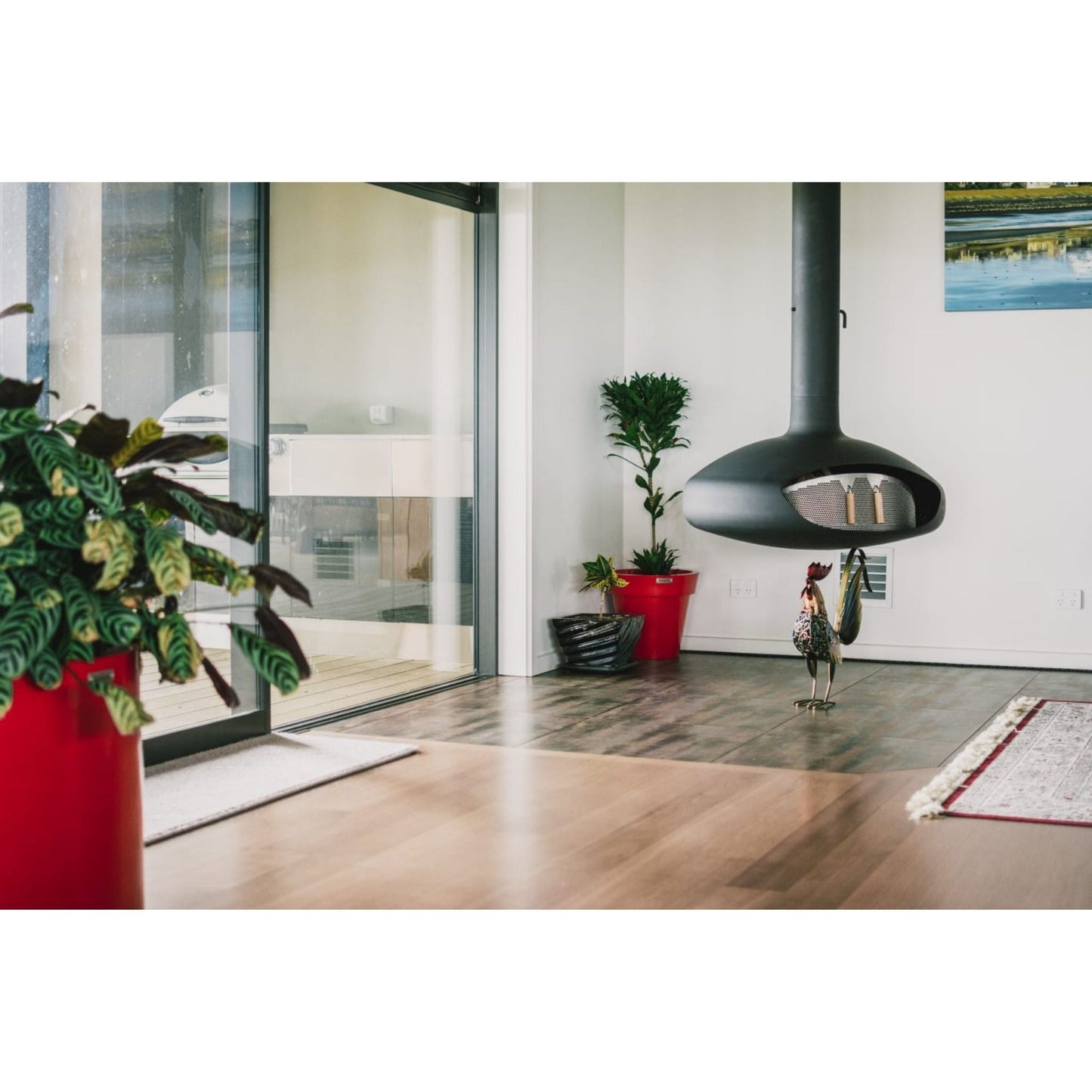 Small indoor planter pots in red made by Modscene.