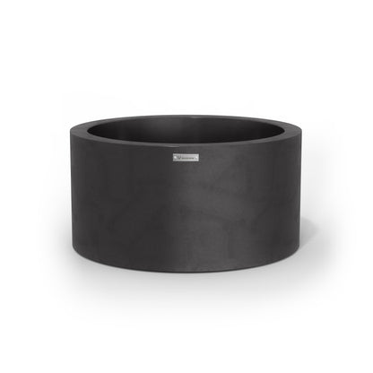 A medium sized planter pot in a matte black colour made by Modscene.