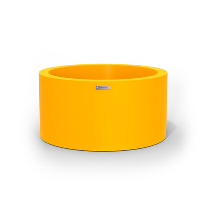 A medium sized yellow planter pot made by Modscene.