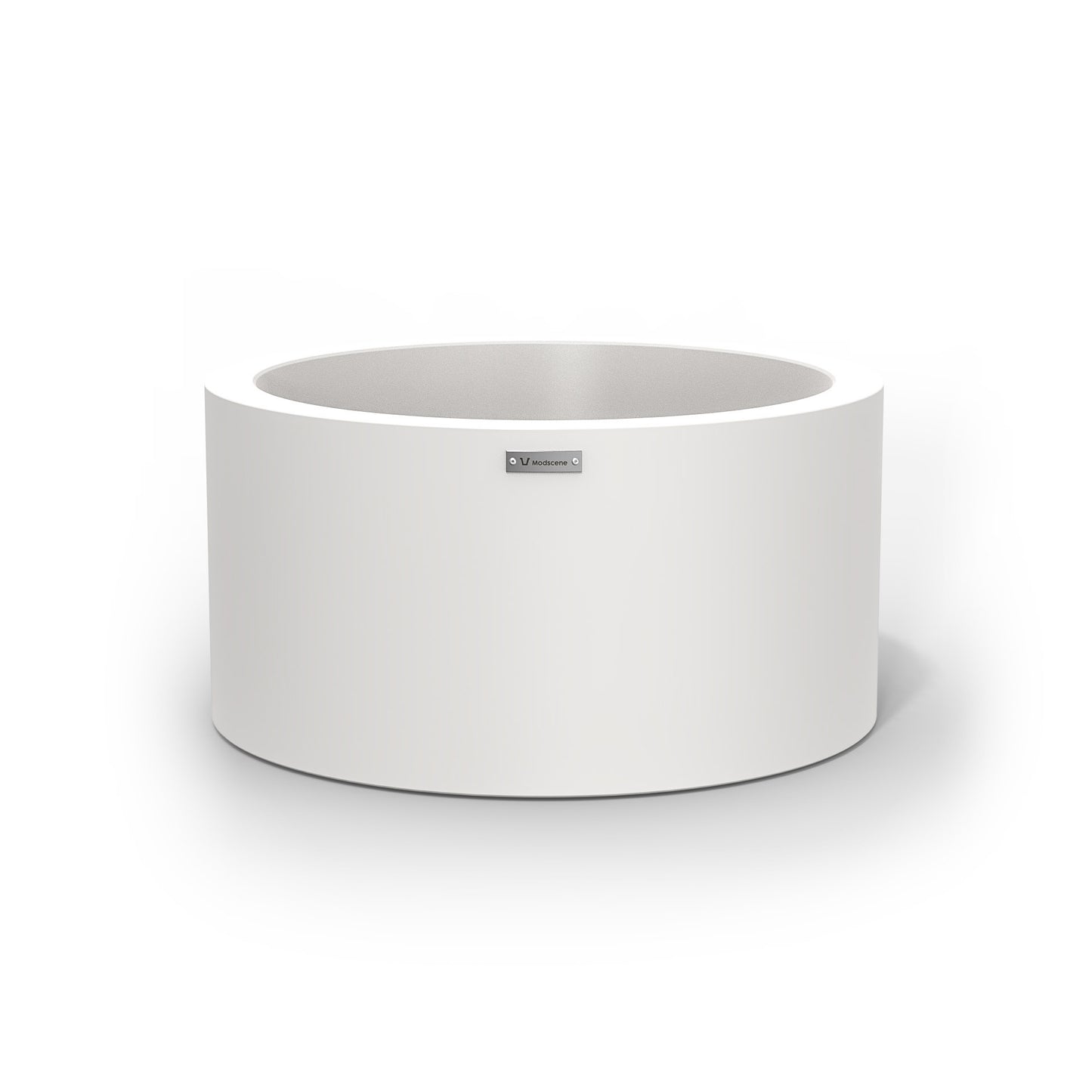 A white cylinder pot planter made by Modscene.