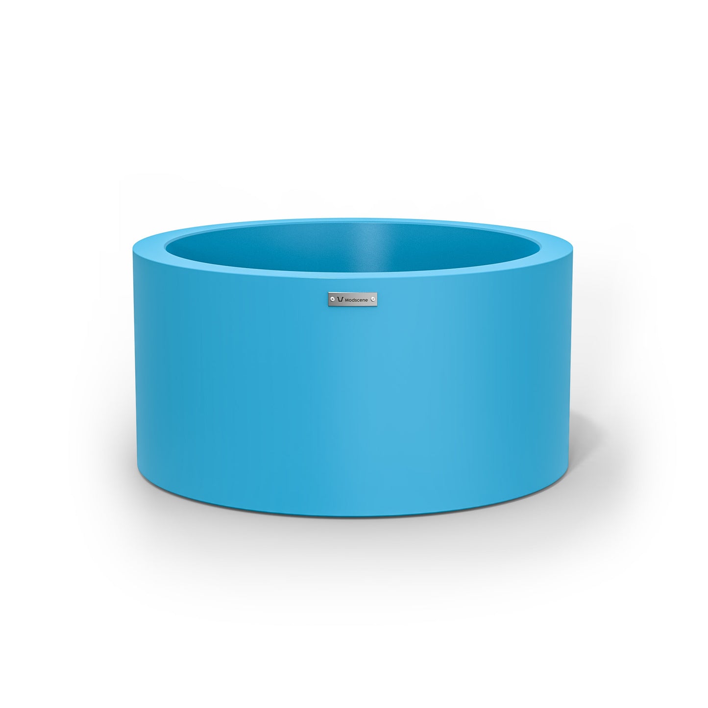 A blue cylinder pot planter made by Modscene.