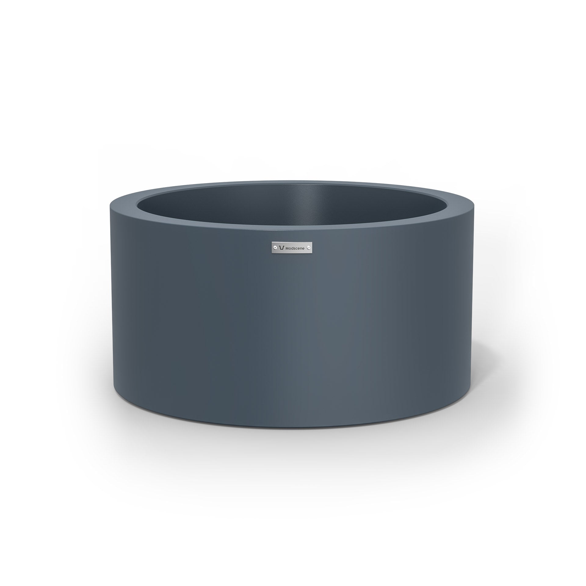 A medium sized planter pot in a storm blue made by Modscene.