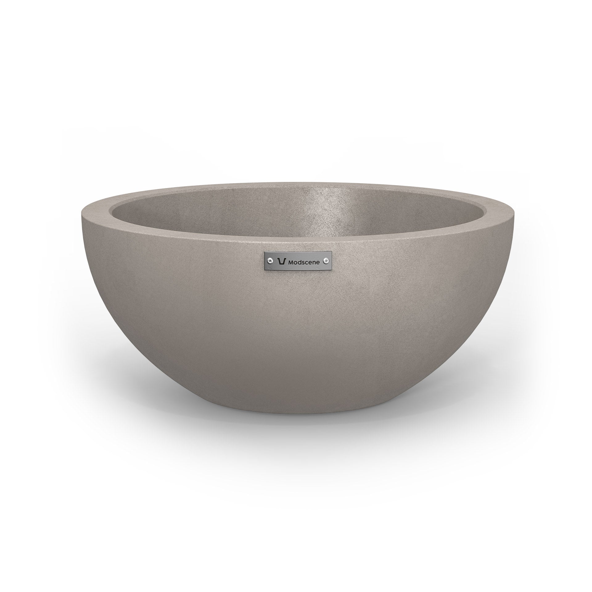 A small planter bowl in a sandstone grey colour with a concrete look finish.