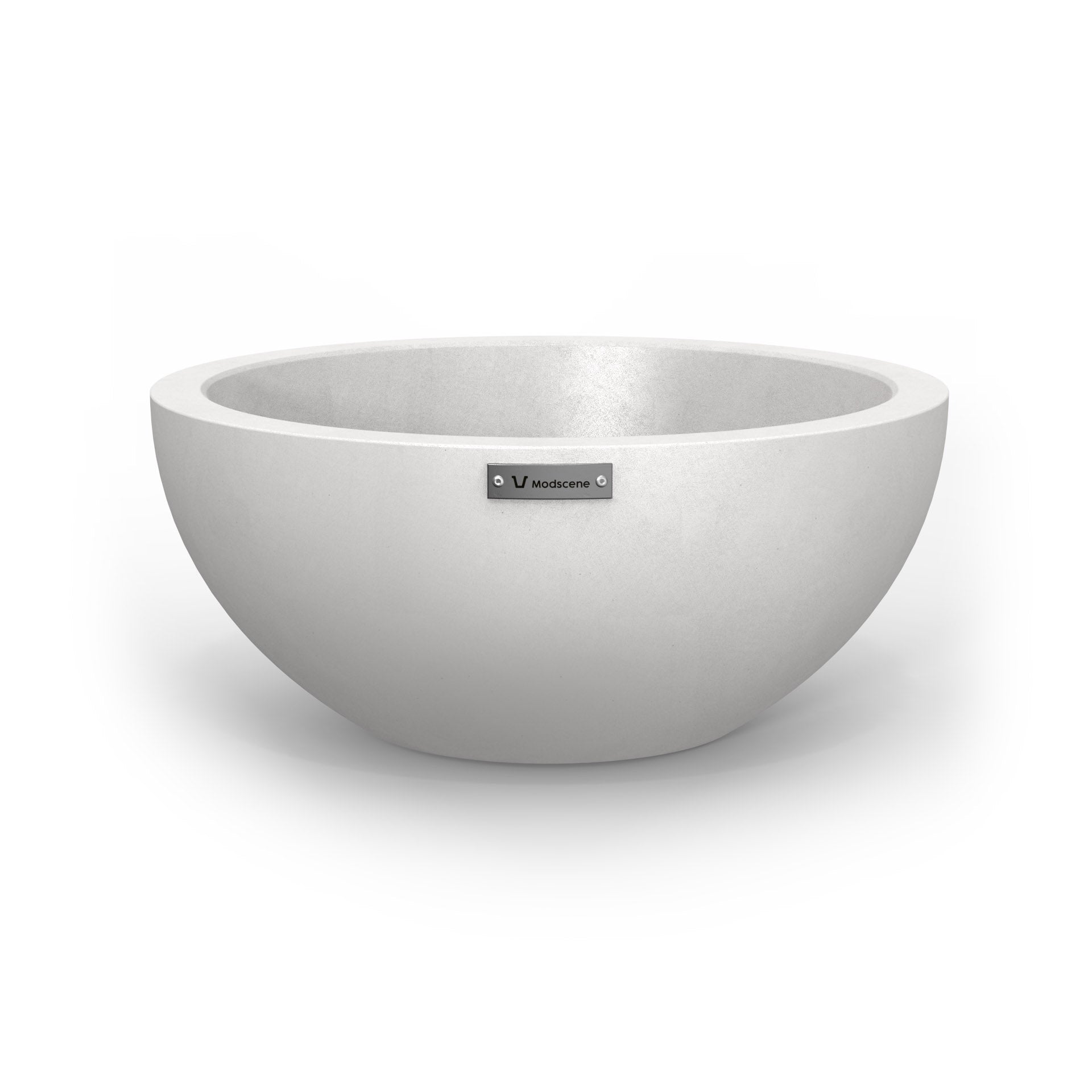 A small planter bowl in matte white made by Modscene.