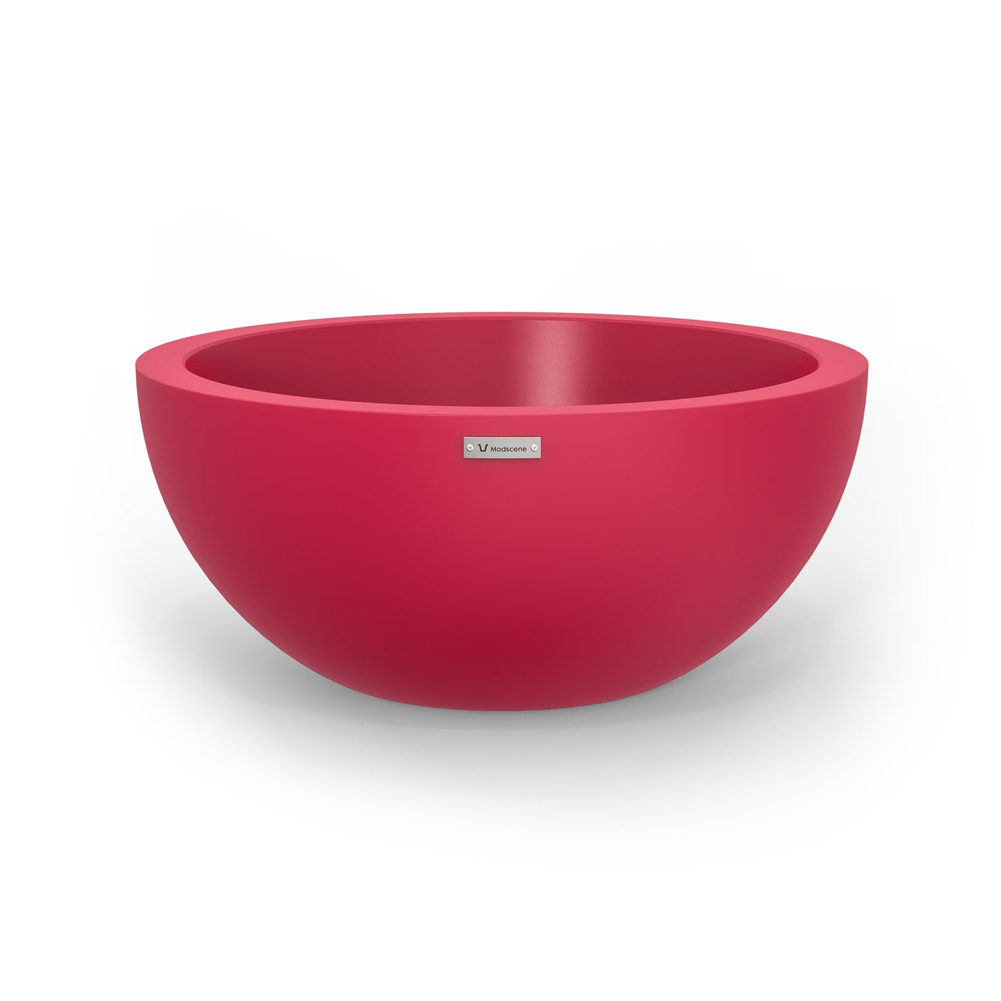 A large planter bowl in pink made by Modscene.