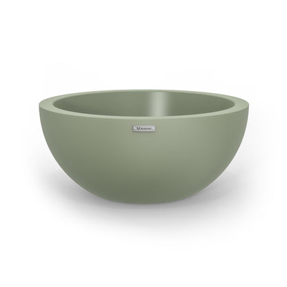 A large planter bowl in a pastel green colour made by Modscene.