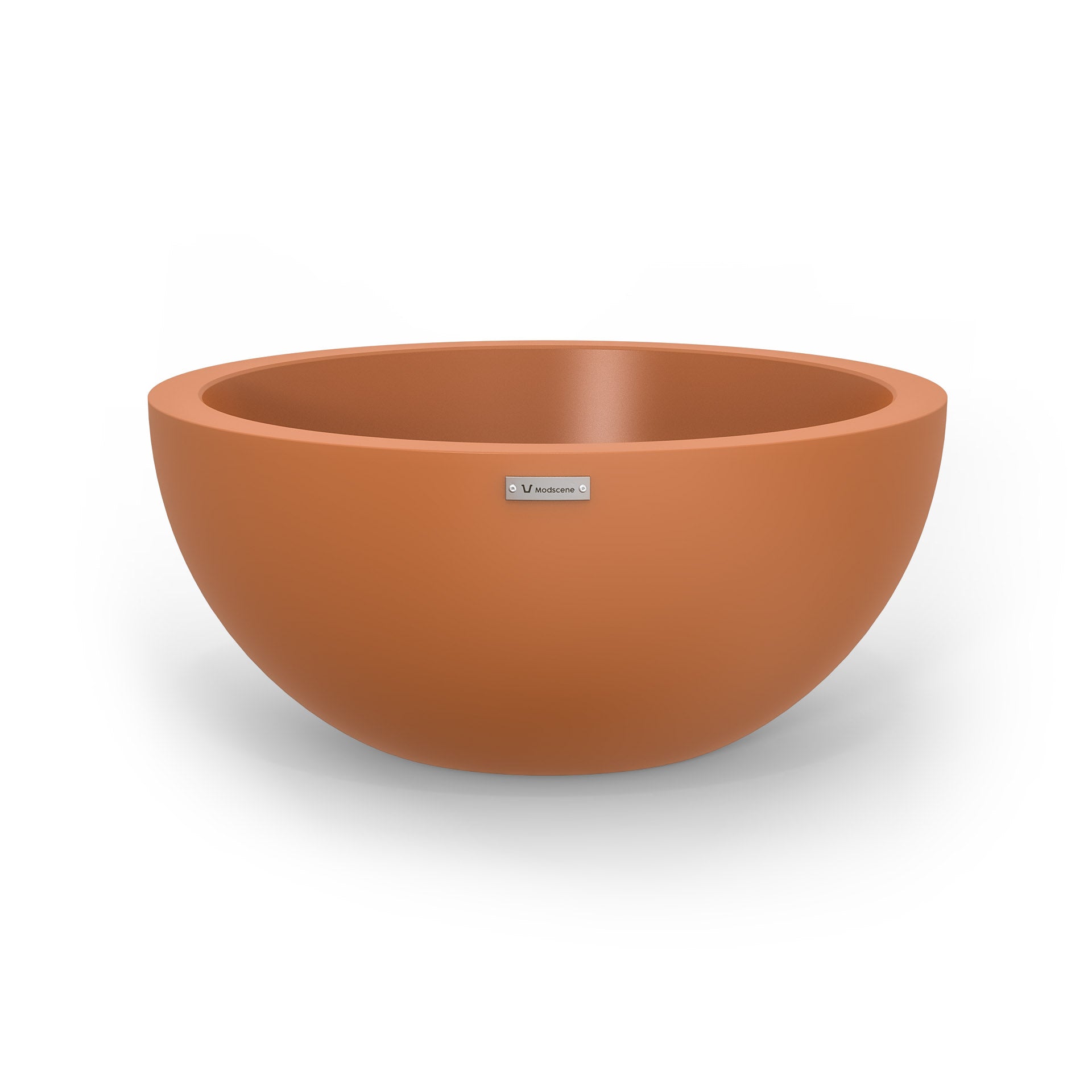 A large planter bowl in a terracotta colour made by Modscene. Australian planters.