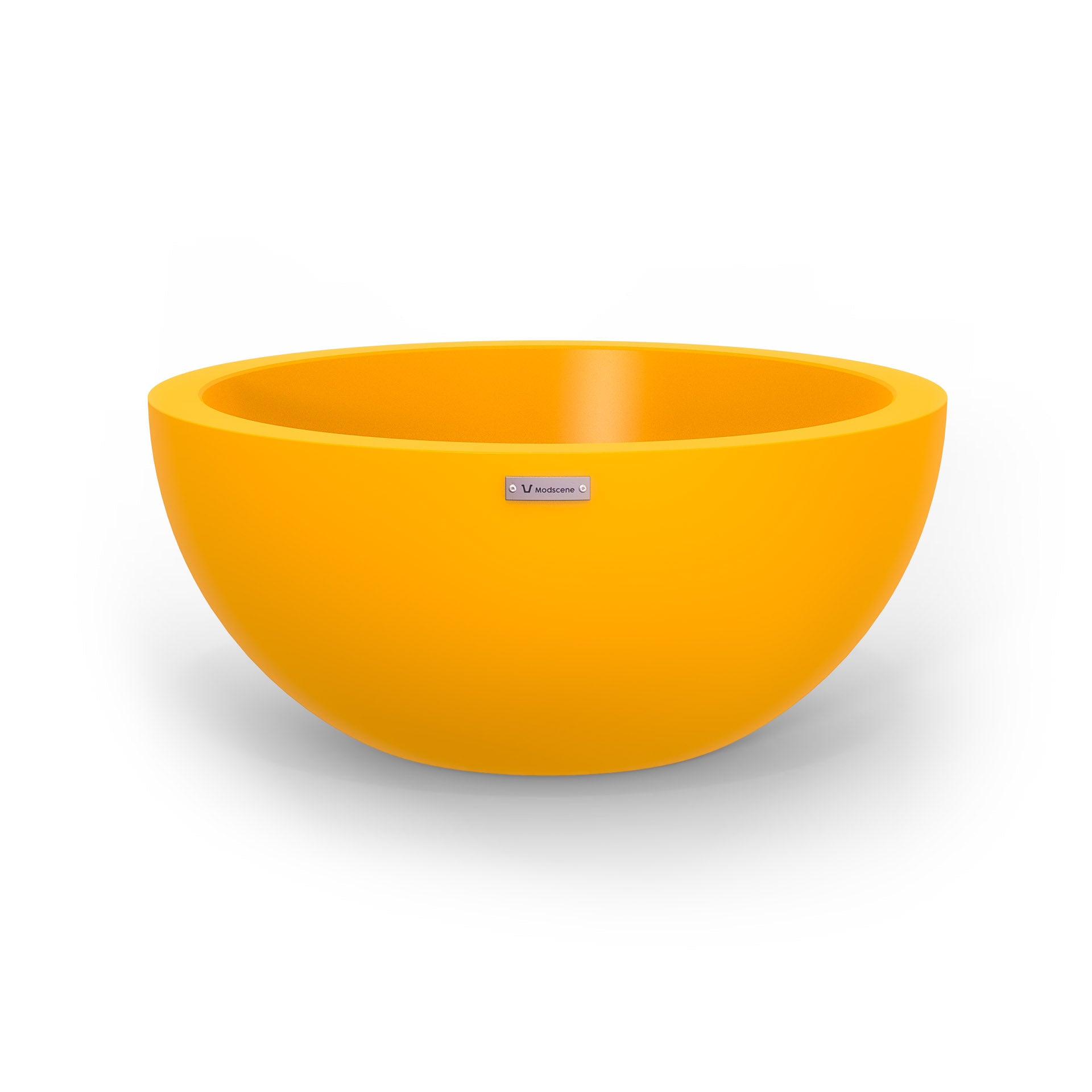 A large yellow planter bowl in yellow made by Modscene.