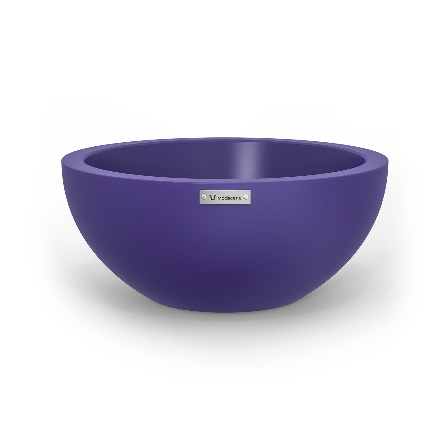 A small planter bowl in purple made by Modscene.