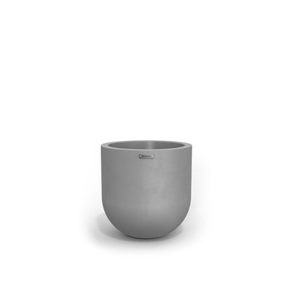 A small round concrete look planter by Modscene. New Zealand made plant pots.