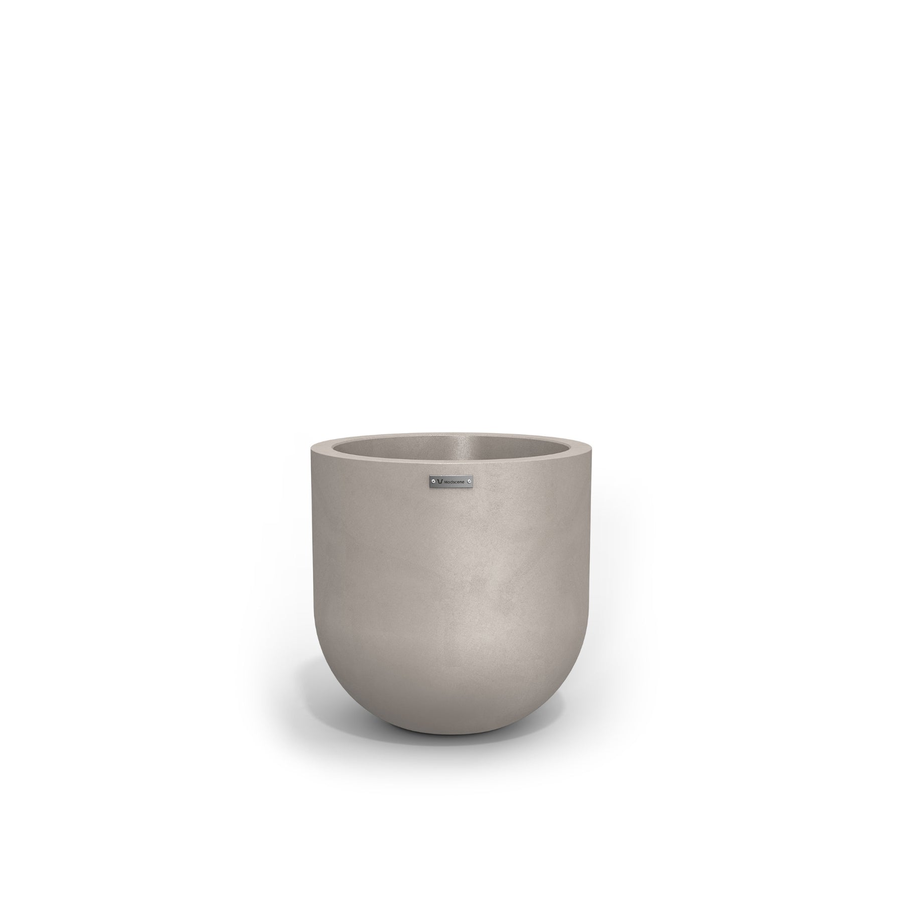 A small round concrete look planter by Modscene. New Zealand made plant pots.