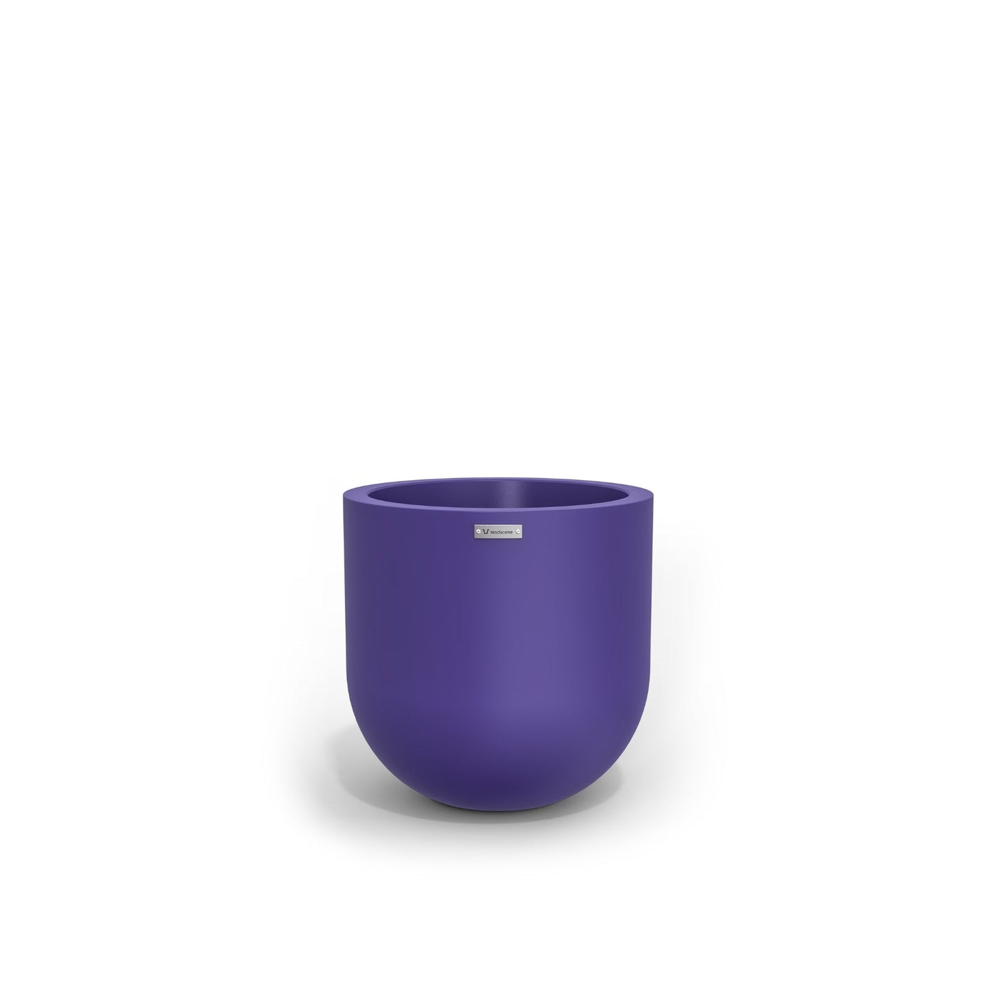 A small round planter in a purple colour made by Modscene. New Zealand made plant pots.