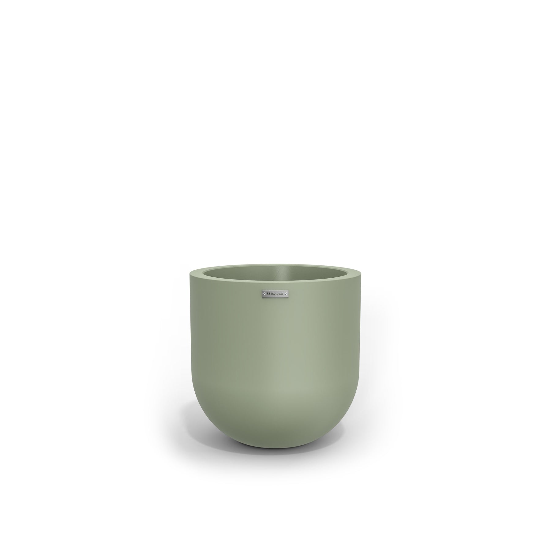 A small round planter made by Modscene in a pastel green colour. New Zealand made pots.