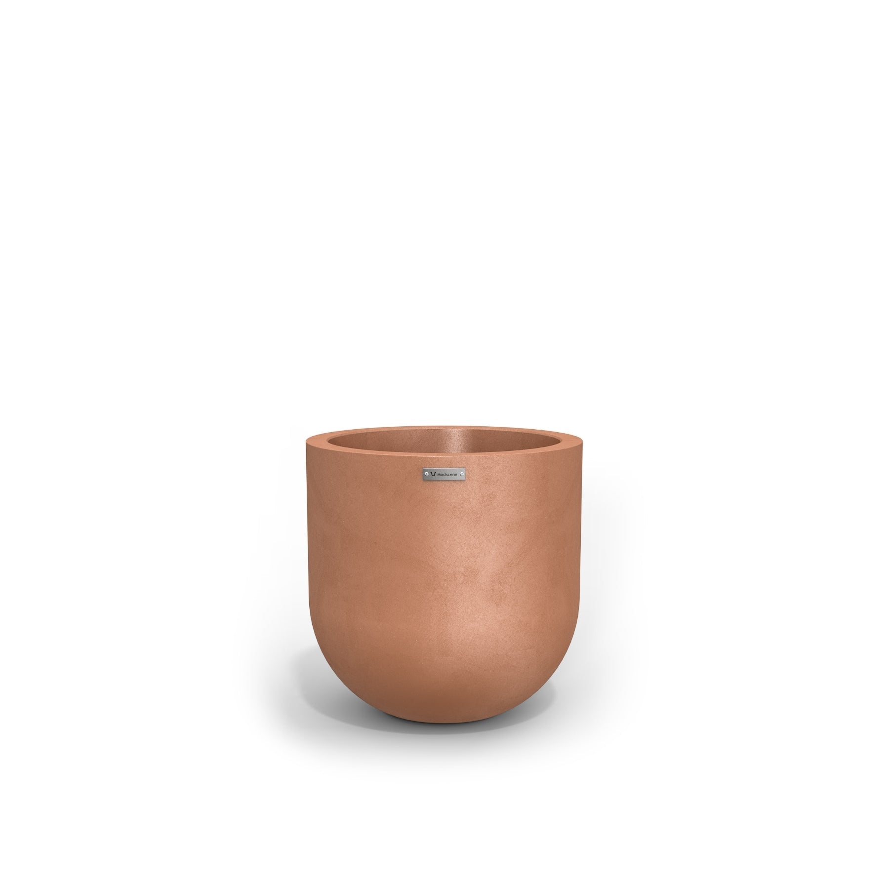 A small round planter by Modscene in a rustic terracotta colour. NZ made plant pots.