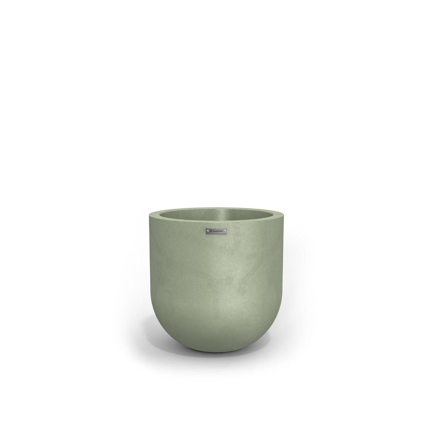 A small round planter by Modscene in a pastel green colour. NZ made plant pots.