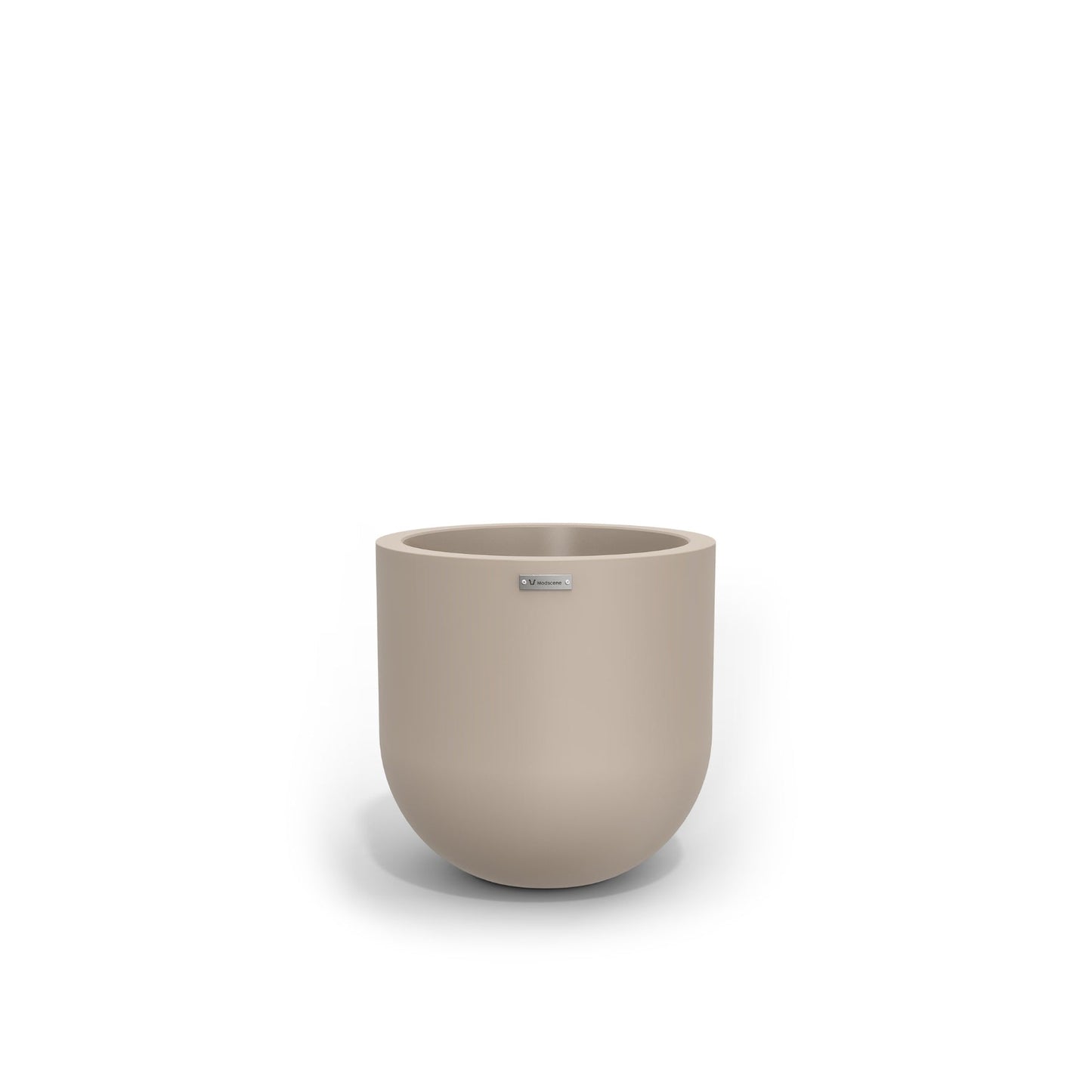 A small egg shaped planter in a sand stone colour. Modscene plant pots.