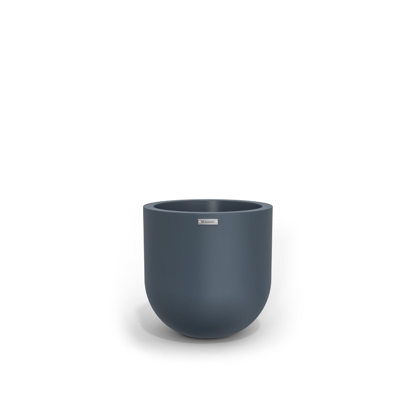 A small egg shaped planter in a storm blue colour. Modscene plant pots.