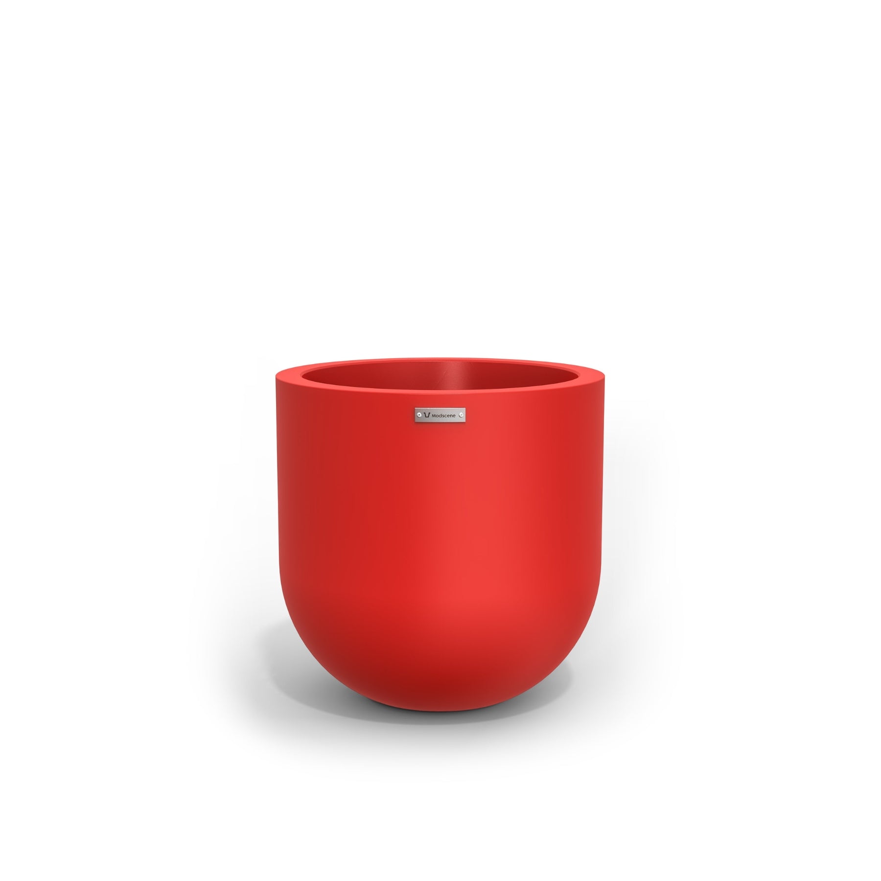 A large egg shaped pot by Modscene in red. NZ made planters.