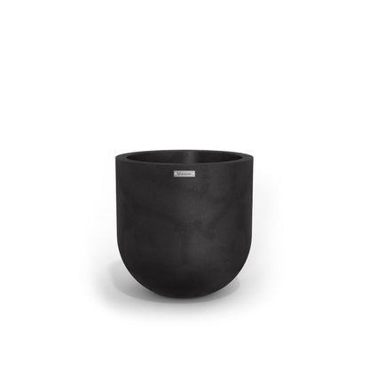 A large egg shaped pot by Modscene in a matte black colour. NZ made planters.