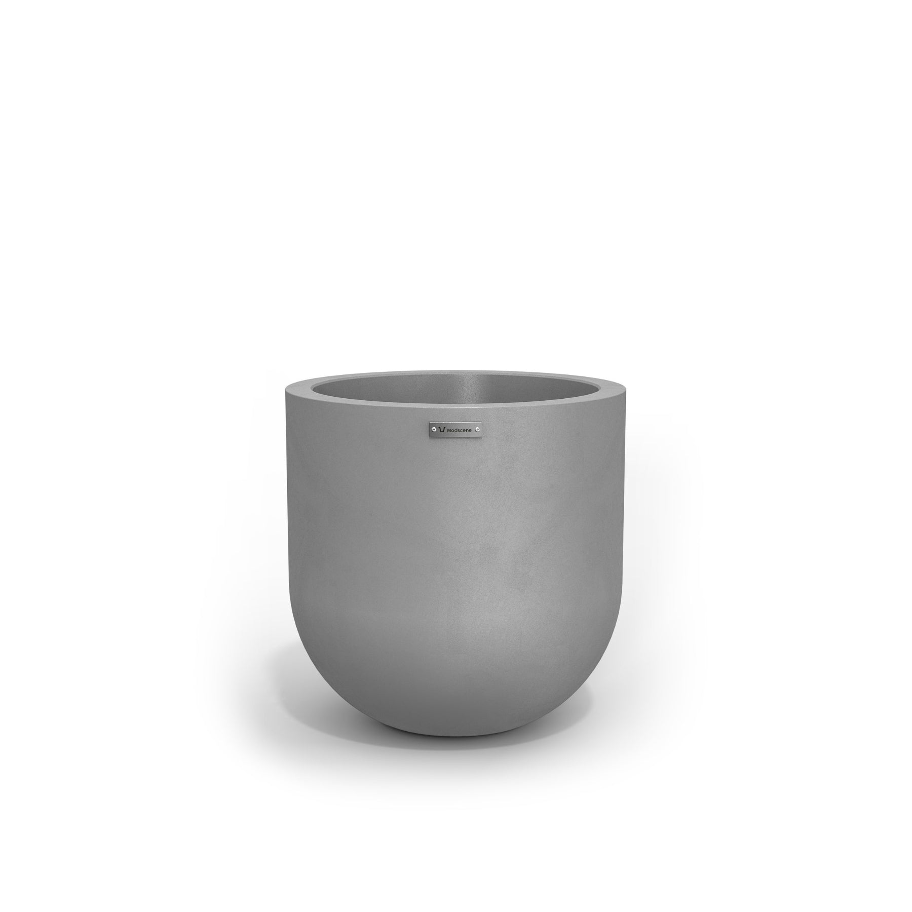 A large egg shaped pot by Modscene in a concrete grey colour. NZ made pots.