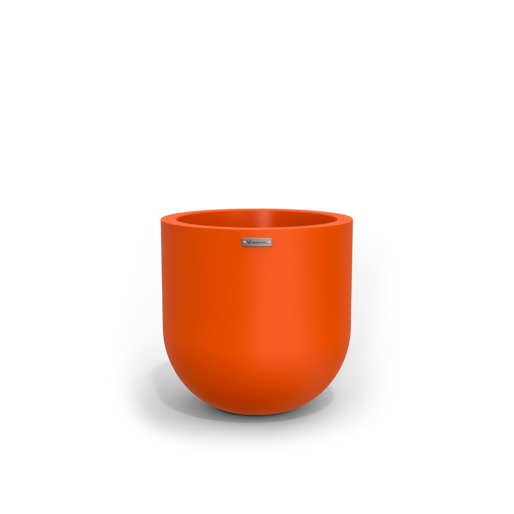 A modern style plant pot by Modscene in an orange colour. NZ made planters.