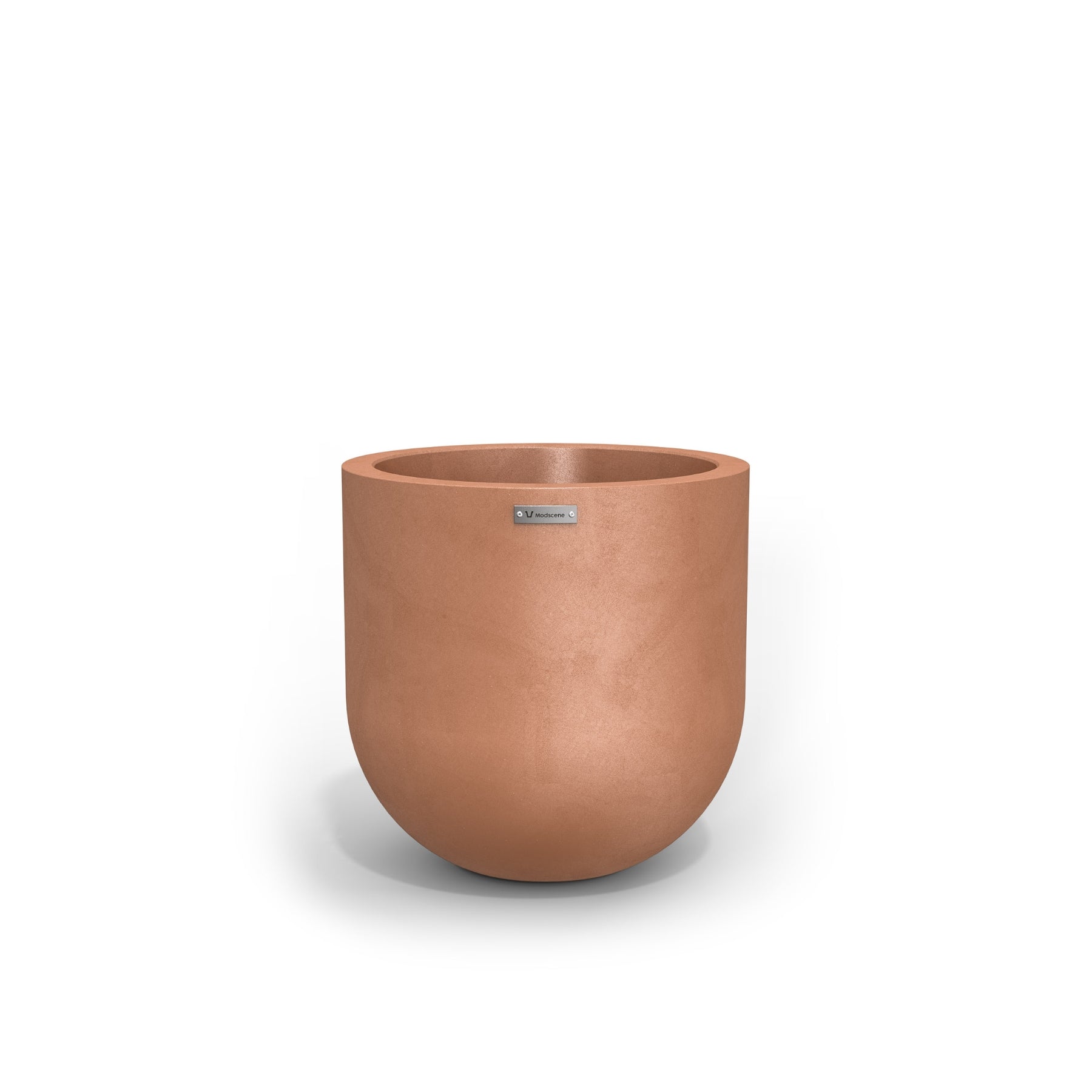 A modern style plant pot in a rustic terracotta colour. New Zealand made pots.