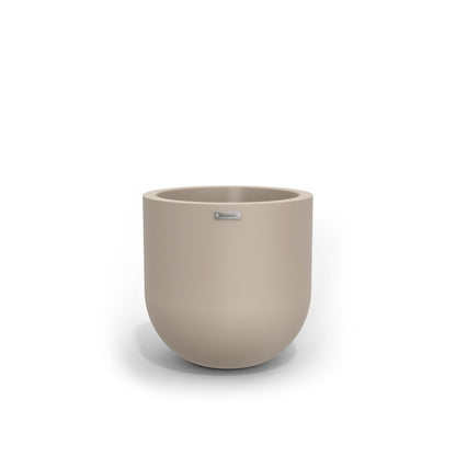 A modern style plant pot in a sand colour. New Zealand made pots.