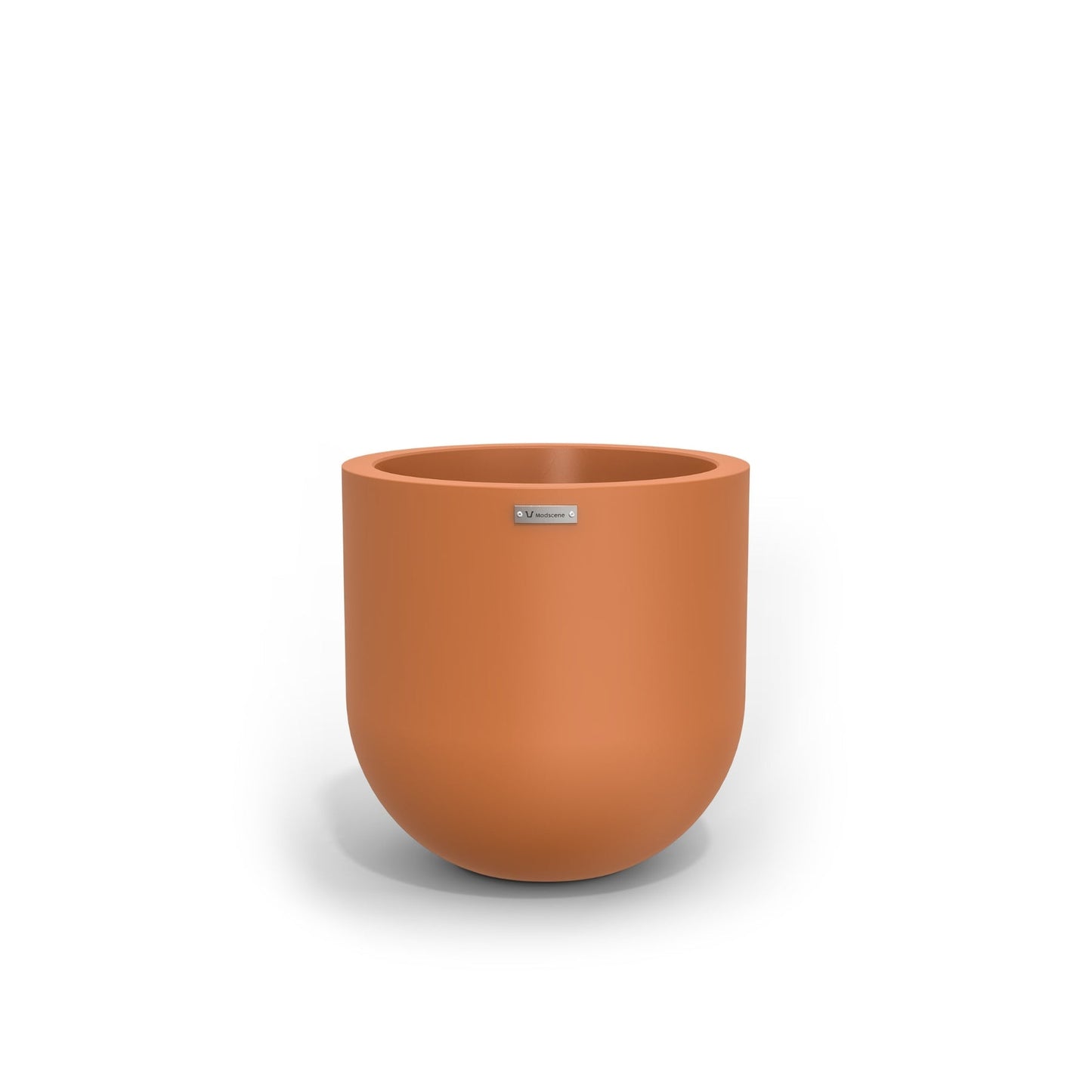 A modern style plant pot in a terracotta colour. New Zealand made pots.