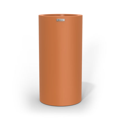 A tall cigar cylinder planter pot in a terracotta colour made by Modscene. Australian planters.