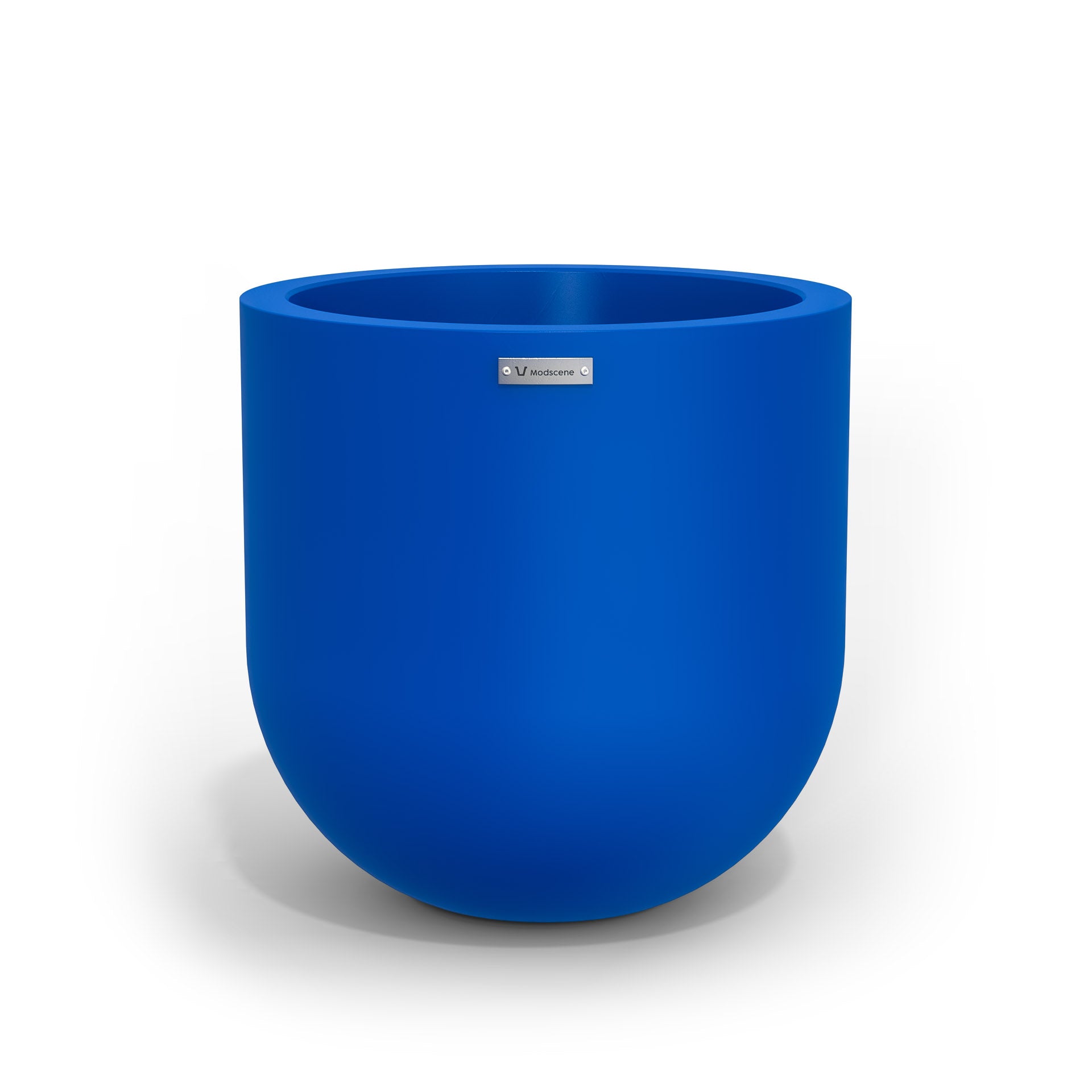 A medium sized planter pot in a deep blue colour made by Modscene.
