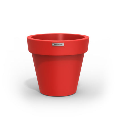 A small red planter pot made by Modscene. Australian pots.