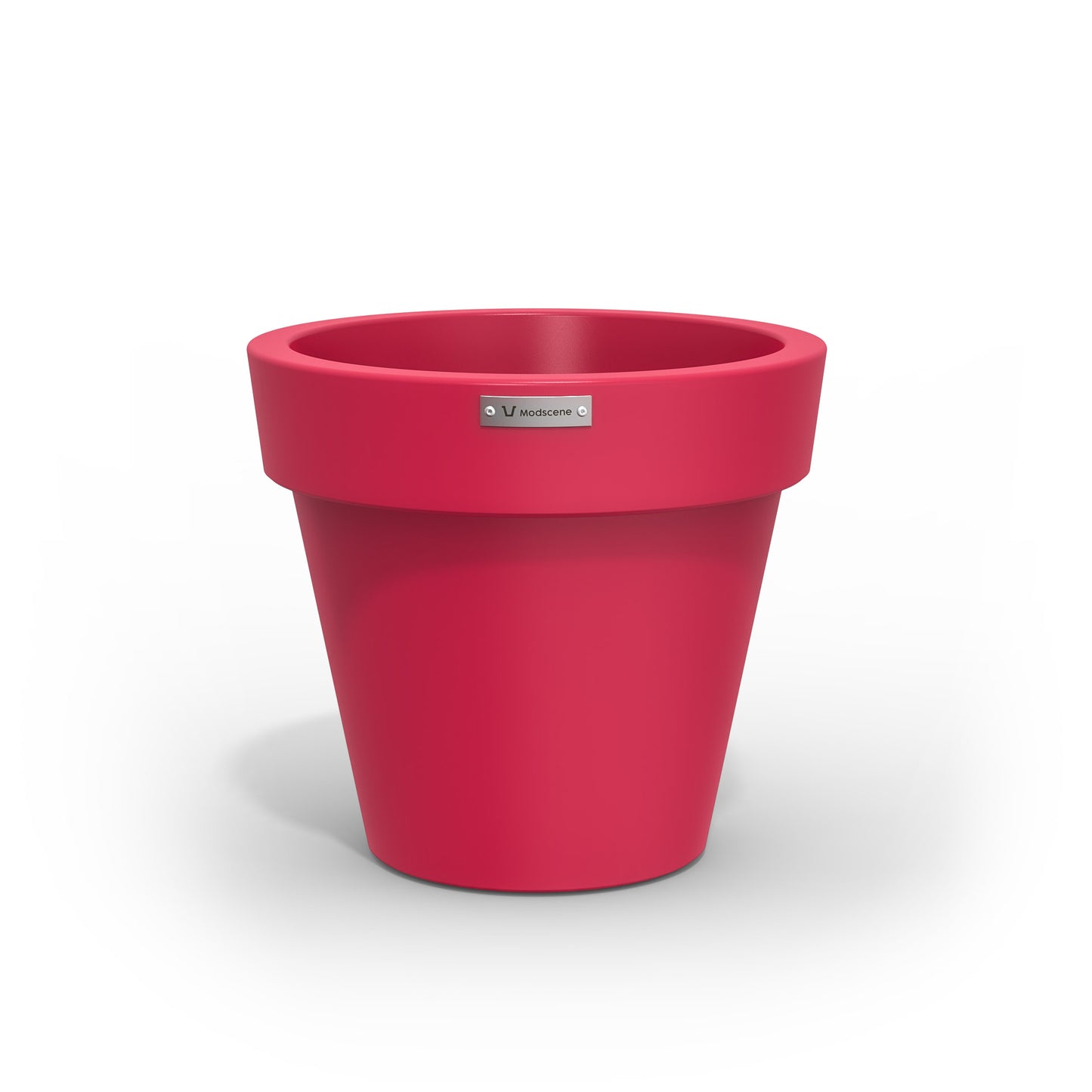 A small pink planter pot made by Modscene. Australian pots.