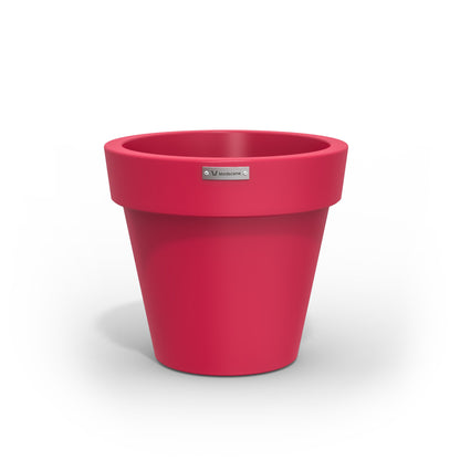 A small pink planter pot made by Modscene. Australian pots.