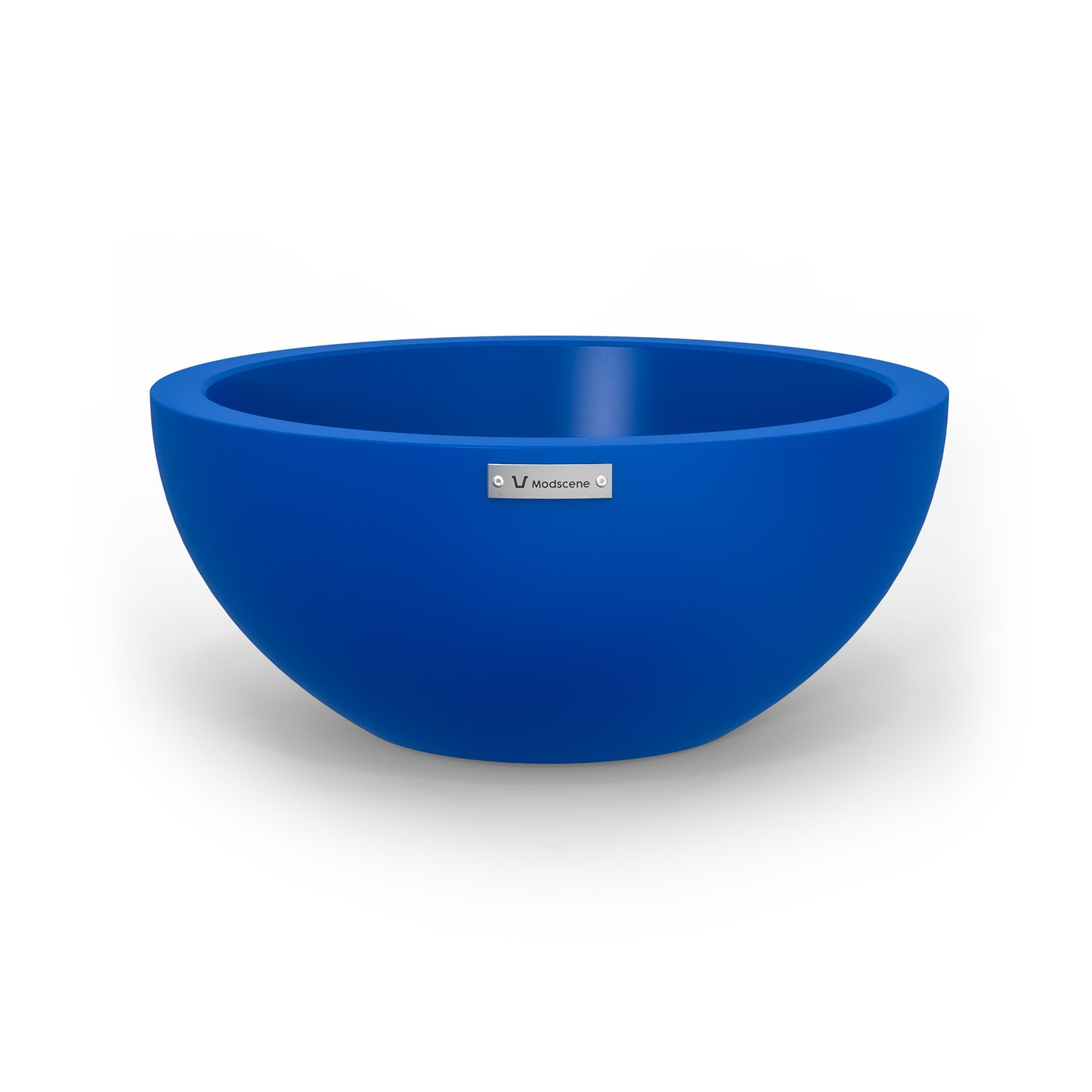 A small planter bowl in a deep blue colour made by Modscene.