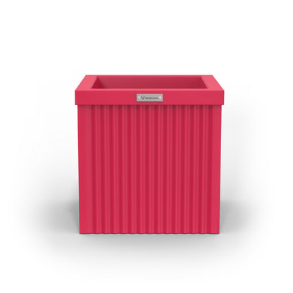 A square corrugated Modscene planter pot in pink.