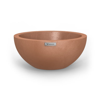 A small planter bowl in a rustic terracotta colour made by Modscene. Australian planters.