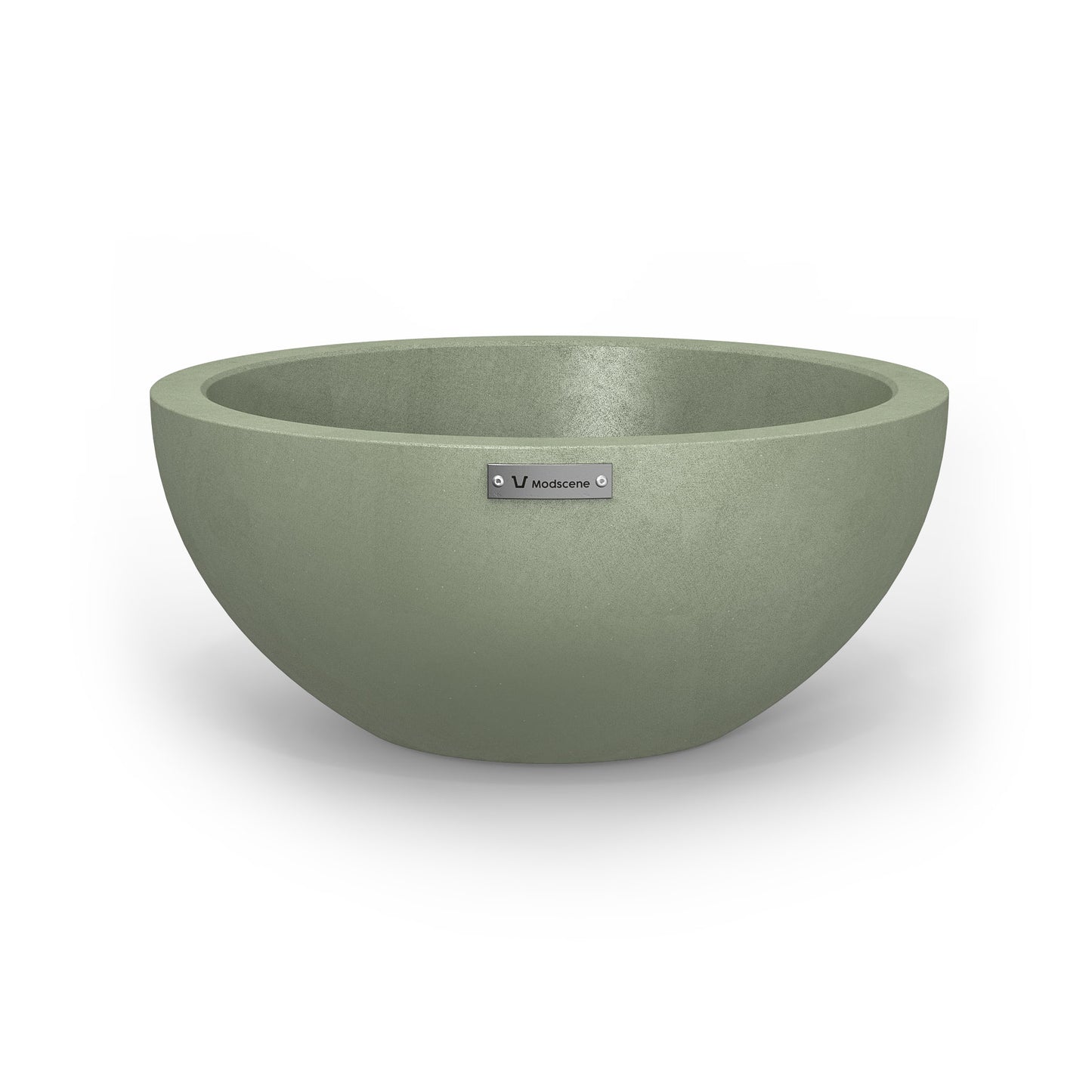 A small planter bowl in a pastel green colour with a concrete look finish.